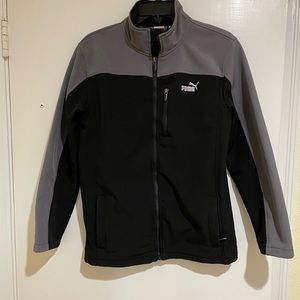 Boys Puma jacket in size large. Black and gray with zip pockets. Very nice!
